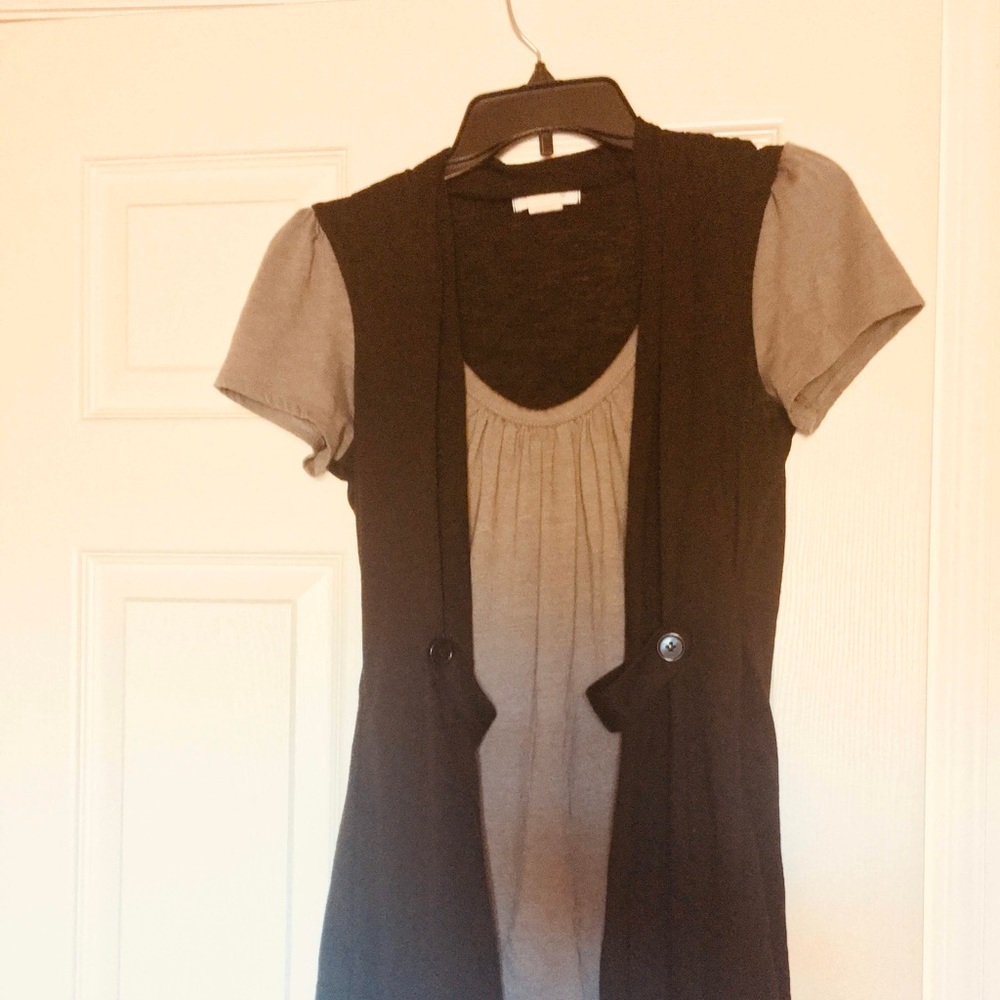 Grey U-neck shirt/blouse with attached black vest